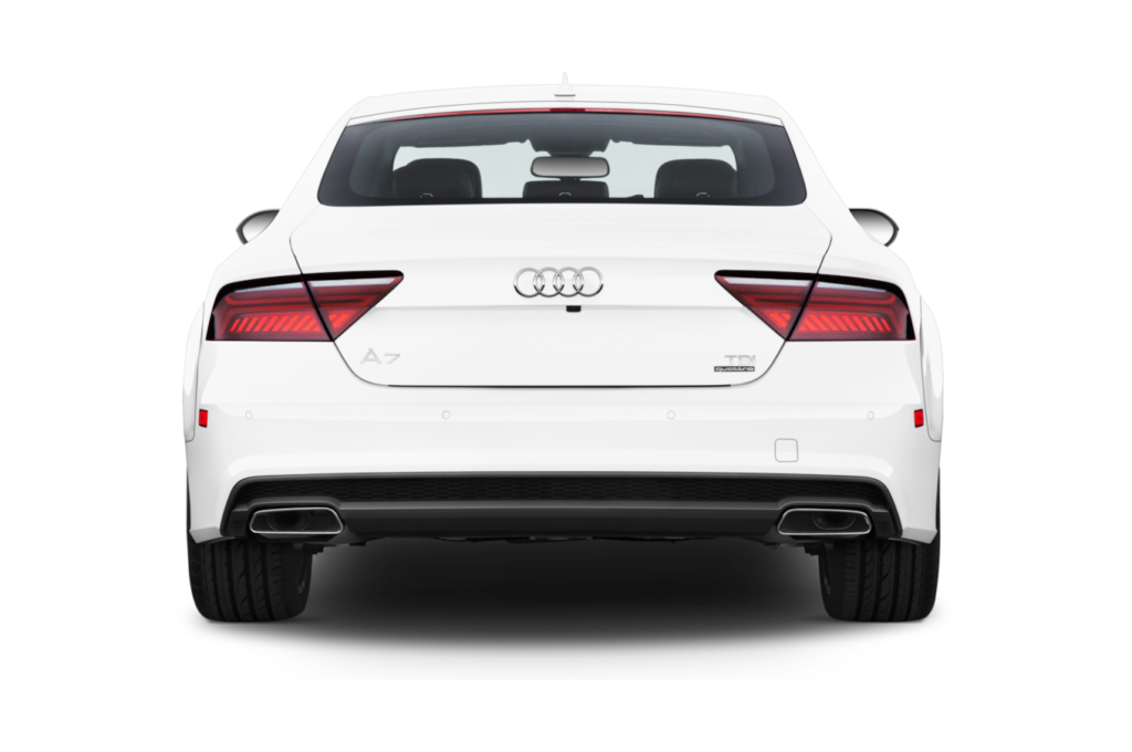 Rear view of a white Audi A7, showing taillights, trunk badge, and dual exhausts”